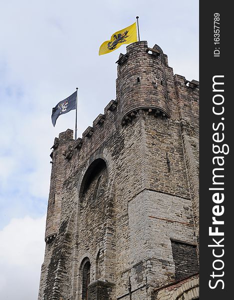 Old castle towers with flag