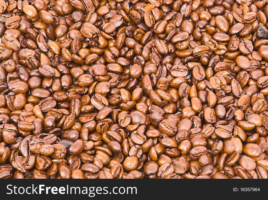 Background of gourmet freshly roasted coffee beans. Background of gourmet freshly roasted coffee beans