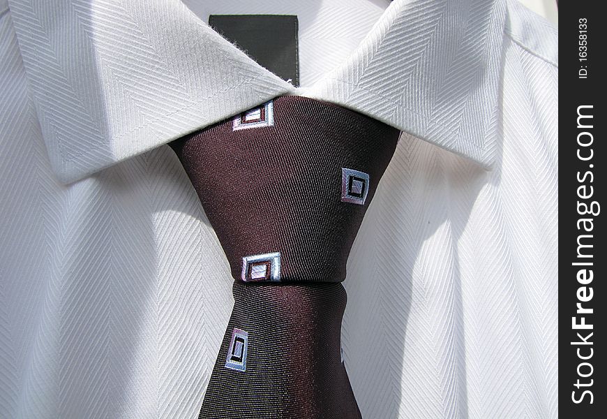 Close up White shirt and purple tie node