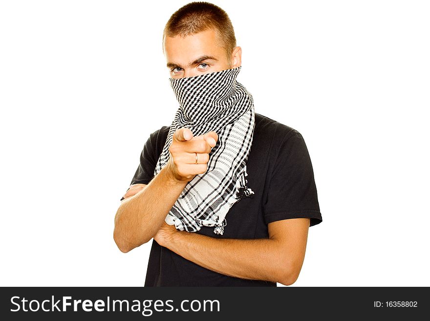 Young man dressed in black t-shirt on the face of a Palestinian scarf. Finger points in the frame. Stubble on his face. Lots of copyspace and room for text on this isolate. Young man dressed in black t-shirt on the face of a Palestinian scarf. Finger points in the frame. Stubble on his face. Lots of copyspace and room for text on this isolate