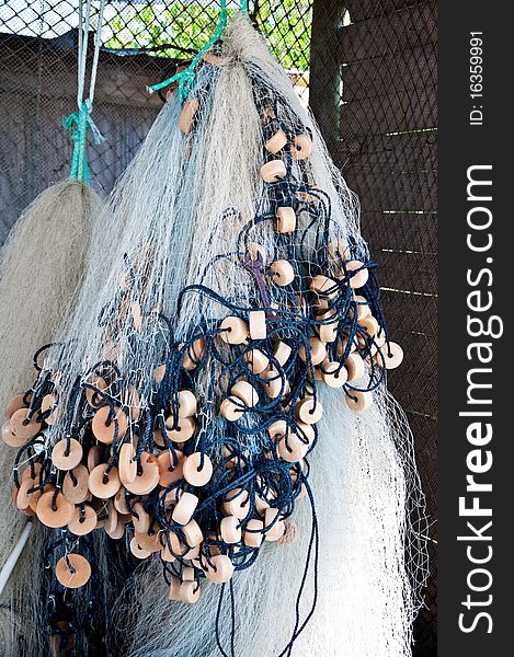 Fish nets hanging from ceiling of fishing shack. Fish nets hanging from ceiling of fishing shack.