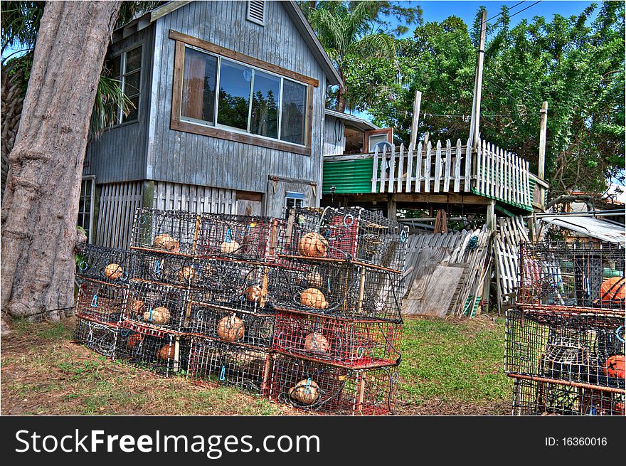 Lobster traps in front of fisherman's shack. Lobster traps in front of fisherman's shack