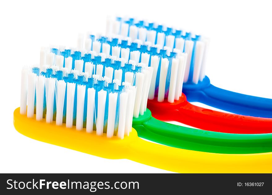 Set of multicolor toothbrushes isolated on white