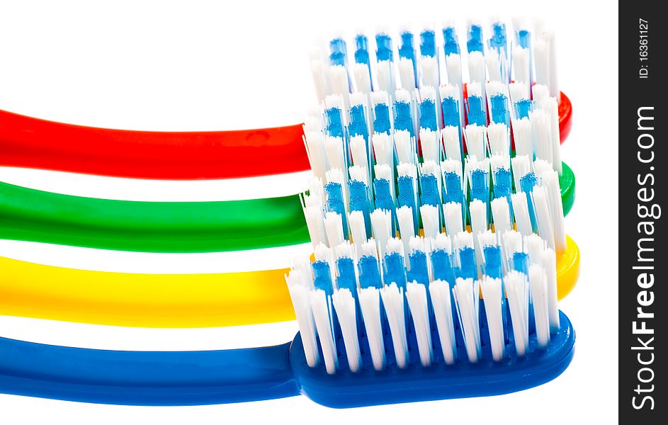 Set of multicolor toothbrushes isolated on white. Set of multicolor toothbrushes isolated on white