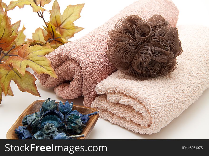 Towel with sponge and blossoms