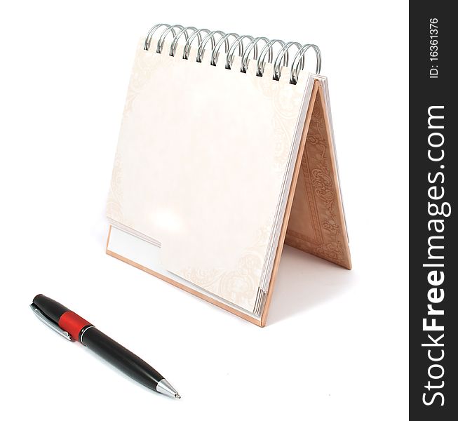 Diary with a pen on a white background