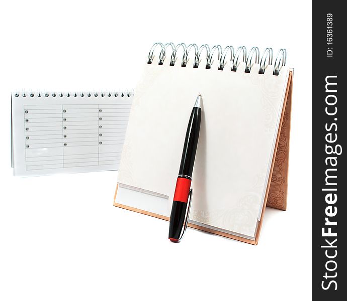 Diary with a pen on a white background
