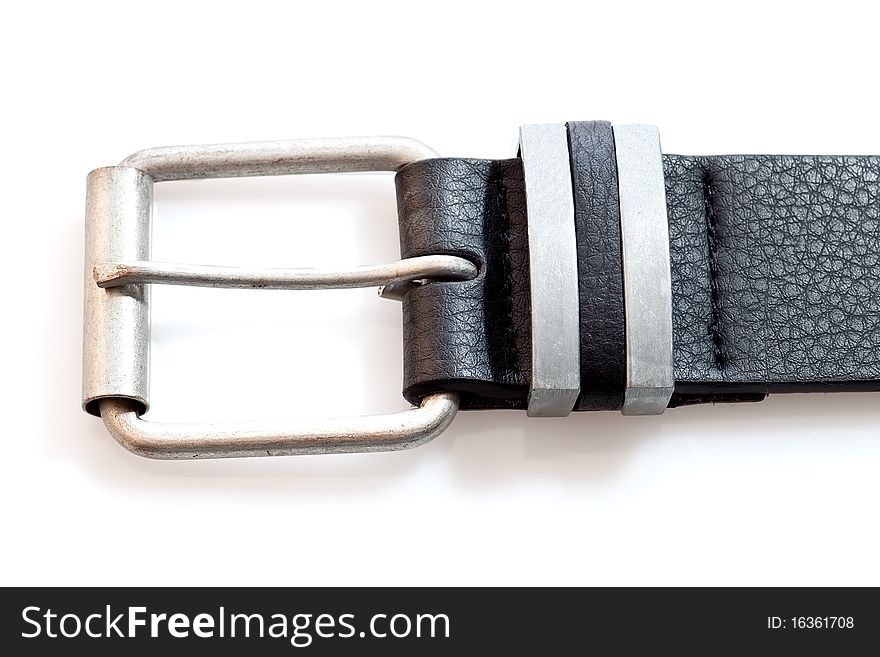 Black leather belt on a white background with shadow