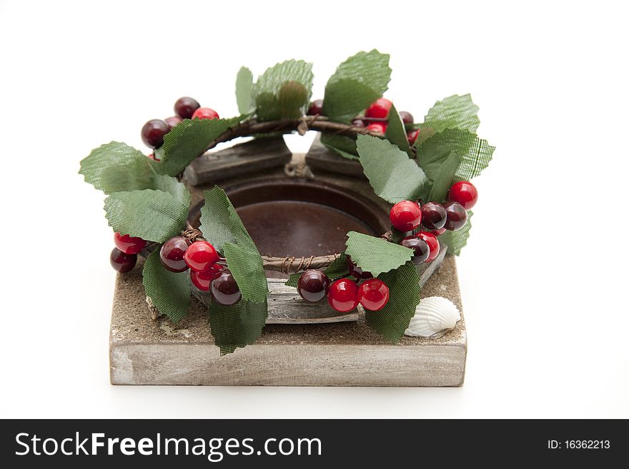 Wreath with berries onto candlesticks. Wreath with berries onto candlesticks