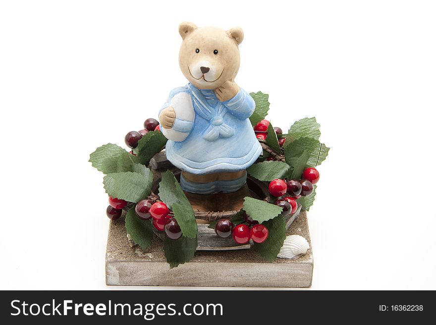 Wreath with bear onto candlesticks