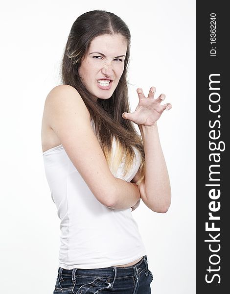 Beautiful young woman angry portrait isolated studio on white background