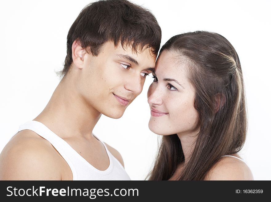 Portrait of a beautiful young happy smiling couple. Portrait of a beautiful young happy smiling couple