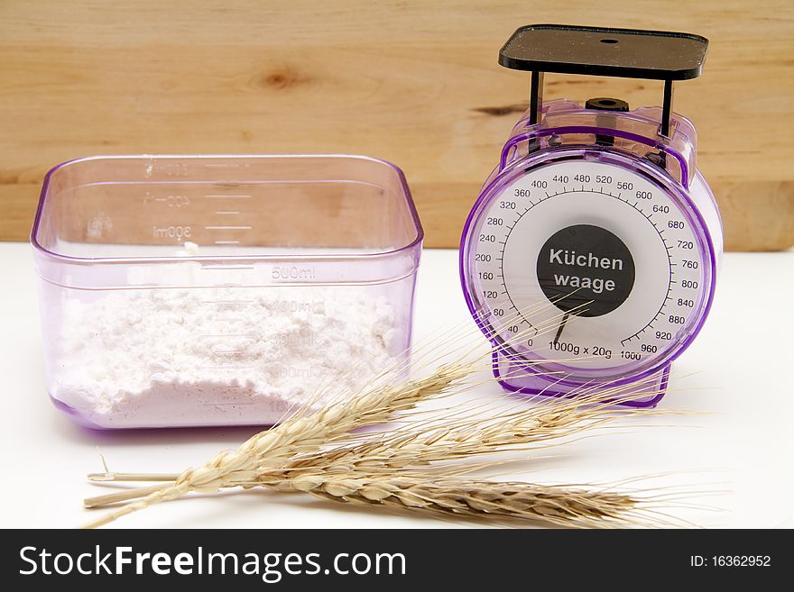 Kitchen scales with wheat flour