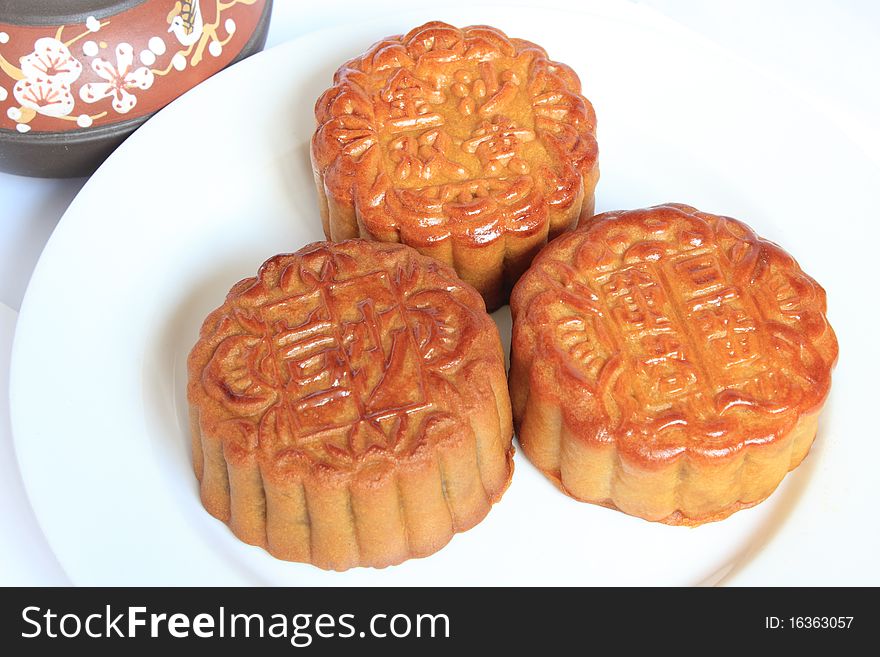 Moon Cakes With Chinese Teapot Close Up View