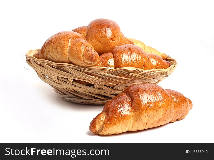 A pile of bread on a white background