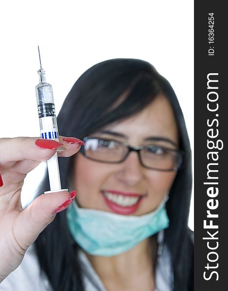 Cute young nurse preparing a vaccine. Cute young nurse preparing a vaccine