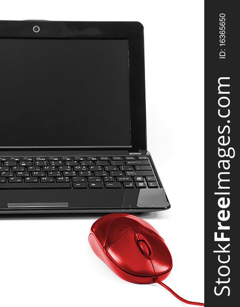 Laptop and a red computer mouse on white background. Laptop and a red computer mouse on white background