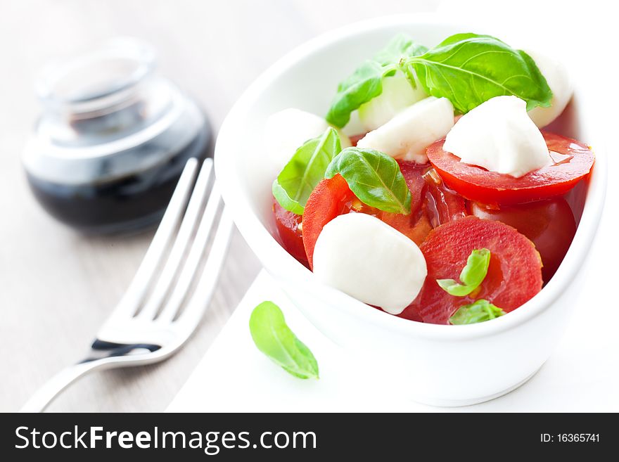 Fresh caprese salad in bowl. Fresh caprese salad in bowl