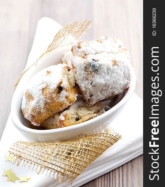 Fresh stollen cookies in a decorated bowl