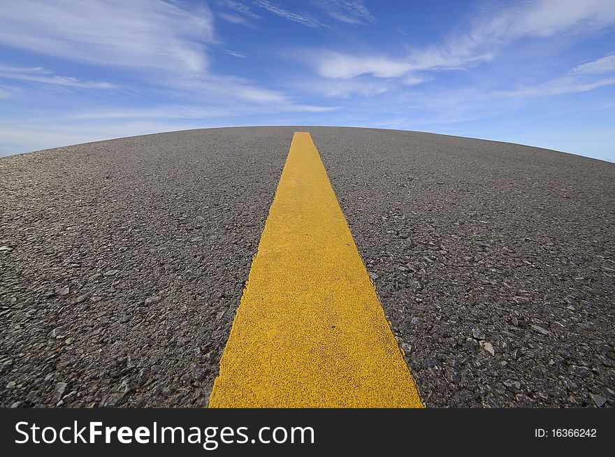 Road Curve And Blue Sky