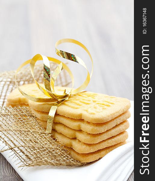 Speculatius cookies stacked and decorated with ribbon. Speculatius cookies stacked and decorated with ribbon