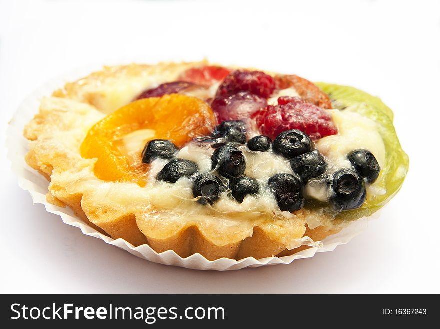 Sweet flan with fruit isolated on a white background. Sweet flan with fruit isolated on a white background