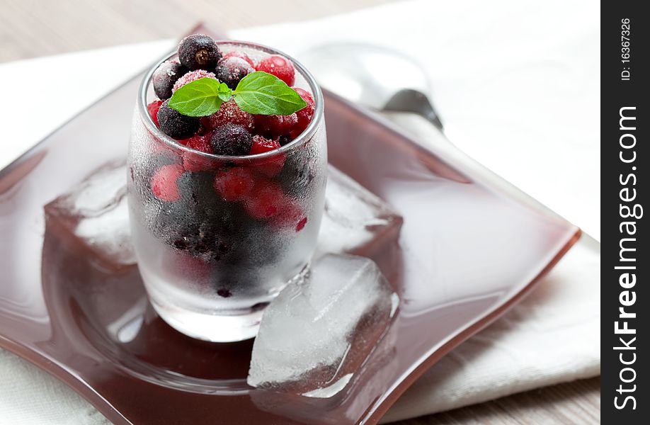 Mixed frozen berry in a glass. Mixed frozen berry in a glass