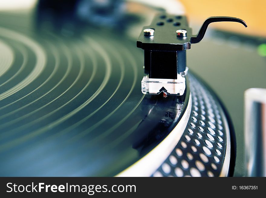 Turntable playing vinyl record