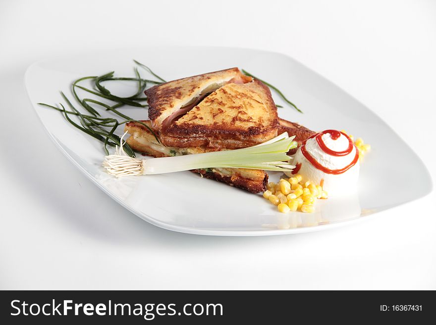 Sandwich with vegetables on a plate