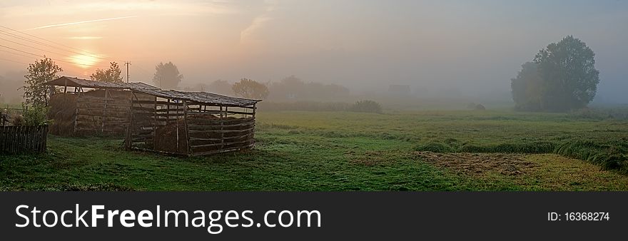 Sunrise in the early autumn morning in the village