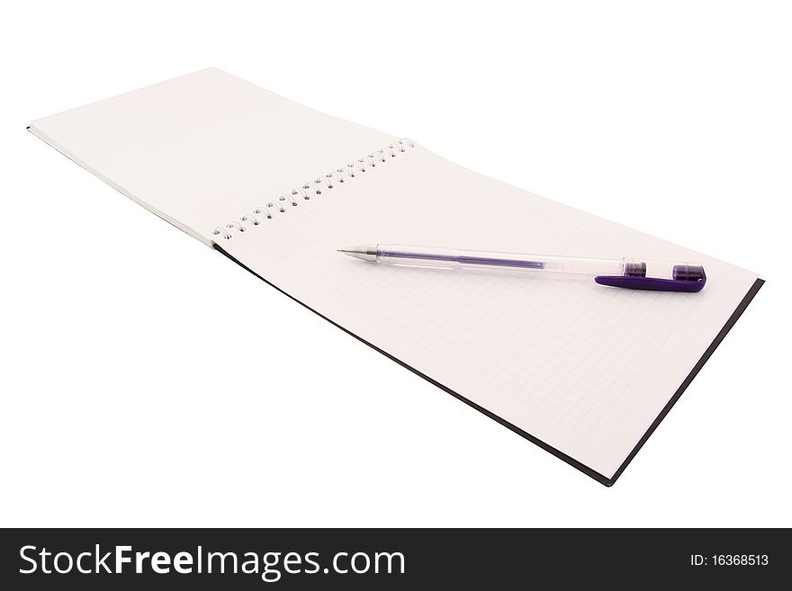 The image of notebook with the pen under the white background