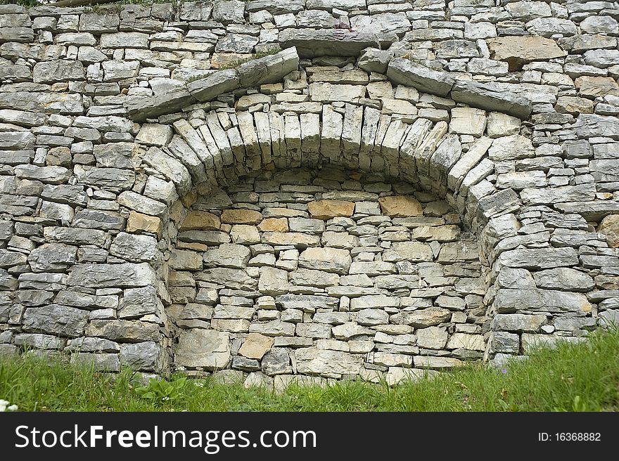 Stone fence in the medieval Italian village