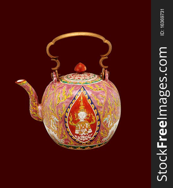 Thai vase with handle and decorative floral pattern isolated on Brown background. Thai vase with handle and decorative floral pattern isolated on Brown background.