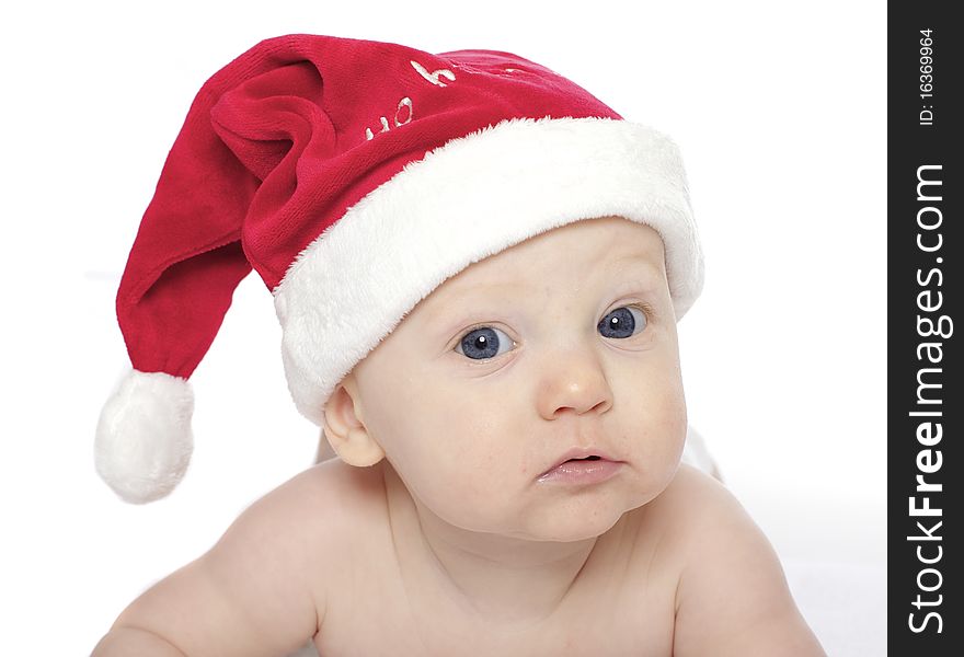 Close up of cute baby boy in santa hat. Close up of cute baby boy in santa hat