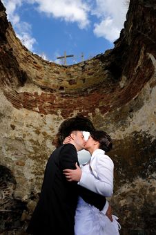 Bride And Groom Kissing Stock Photography