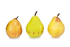 Two Ripe Fresh Pears And Green Plastic Pear Timer Royalty Free Stock Images Two Ripe Fresh Pears And Green Plastic Pear Timer Royalty Free Stock Images