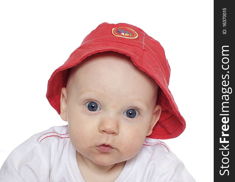 Cute baby boy in red hat
