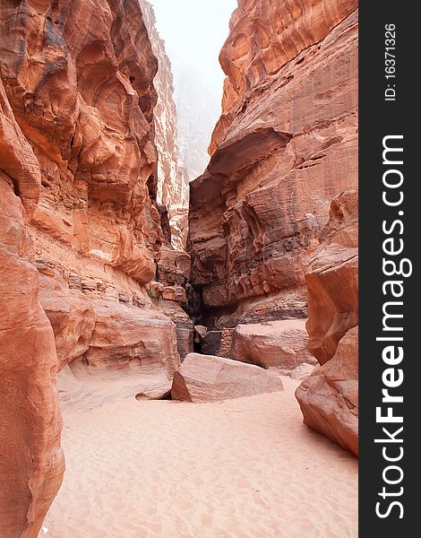 Eroded cliff of Khazali canyon in Wadi Rum containing many rock inscriptions. Jordan