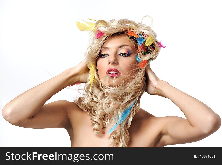 Blonde girl with feathers