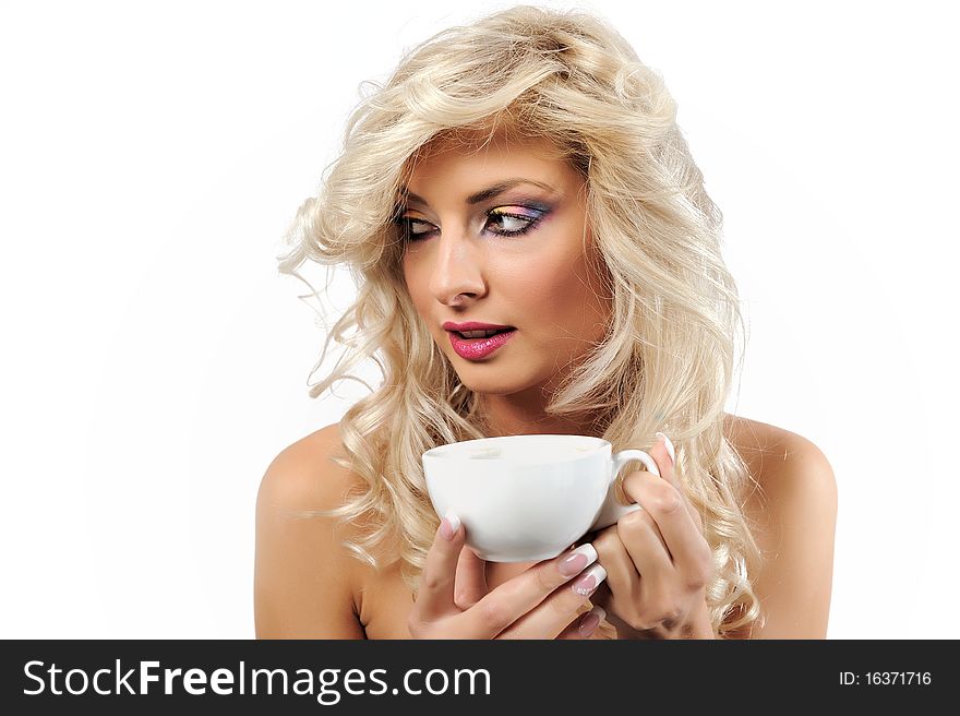 Blonde girl with a cup of coffee