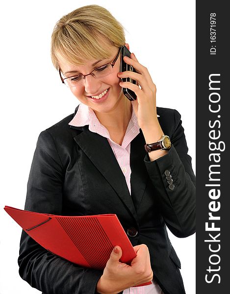 Young attractive business woman talking on the phone. Young attractive business woman talking on the phone
