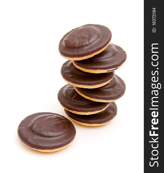 Round chocolate cookies pyramid stack isolated on white