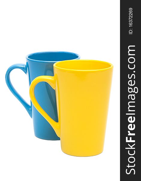 Yellow and blue mug on a white background