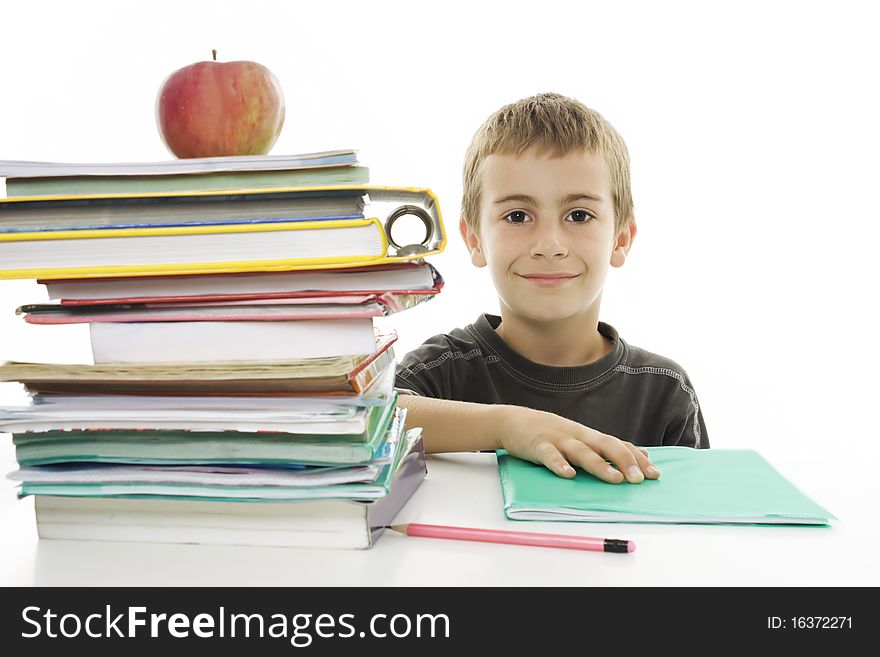 Adorable boy studying a over white background