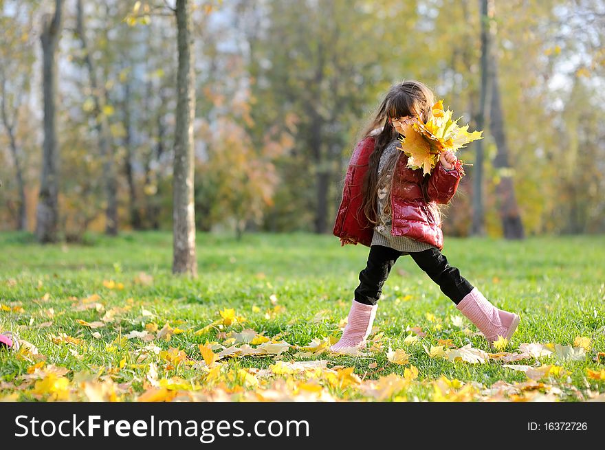 Adorable small girl with long dark hair