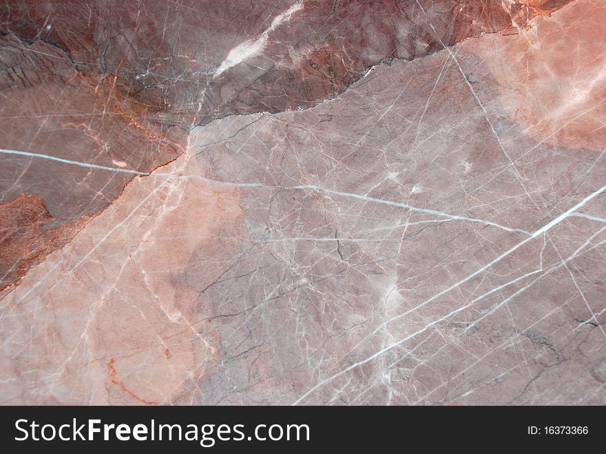 Red and brown marble with thiny white line
