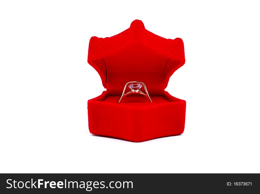 Gold ring with a diamond in the red box