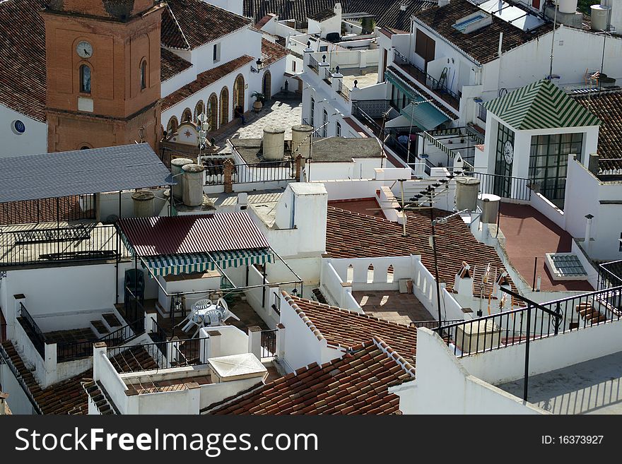 Rooftops, church and market place in the Andalusian town of Competa, about an hour away from Malaga, Southern Spain. Rooftops, church and market place in the Andalusian town of Competa, about an hour away from Malaga, Southern Spain.