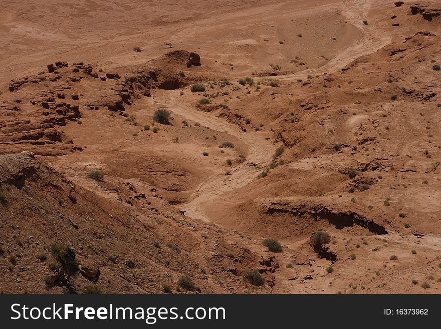A trail left by water run off in the desert. A trail left by water run off in the desert.
