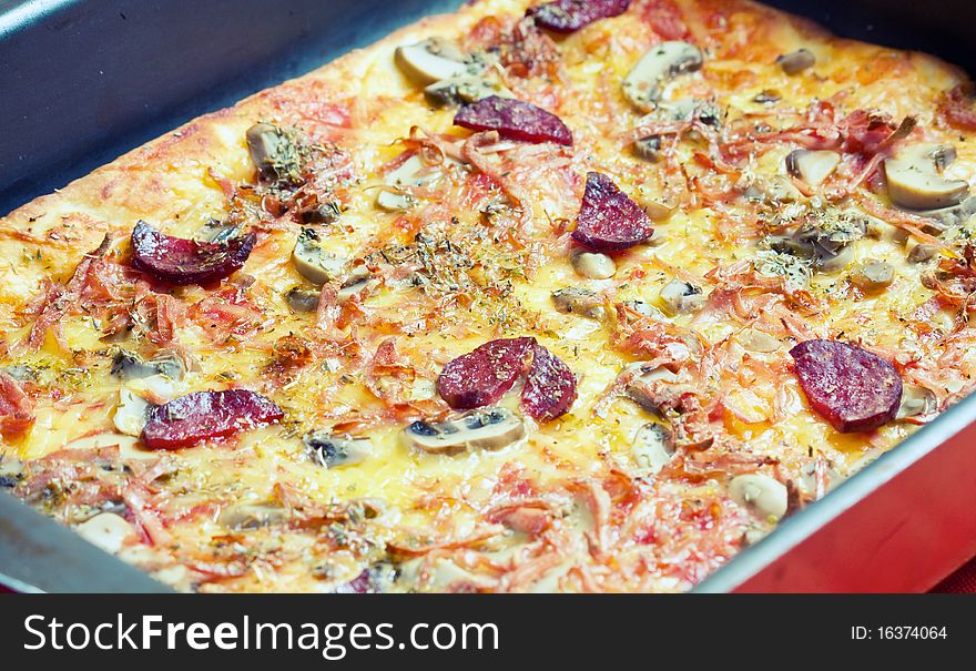 Pizza food with cheese, mushroom and sausage
